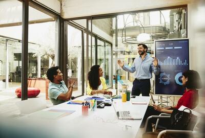 Diverse Business Team during Meeting in Office Conference Room 