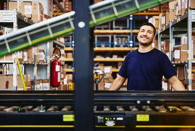A man in a warehouse
