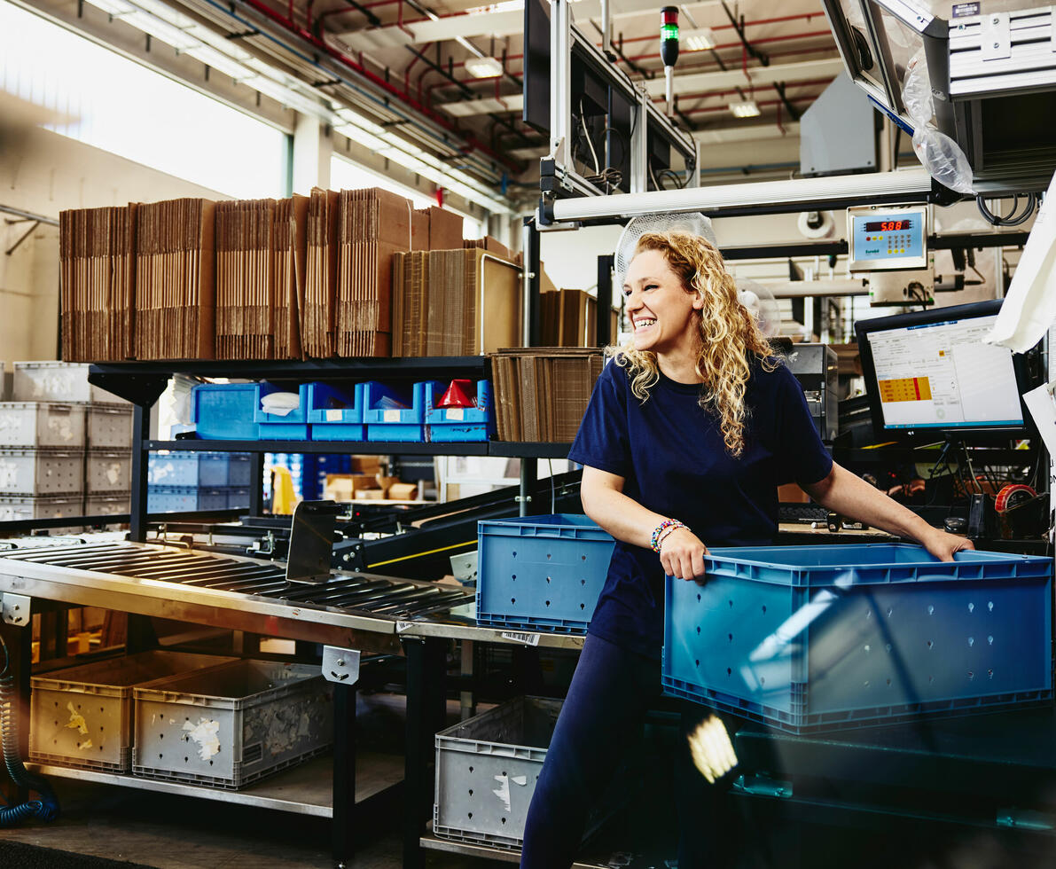 A woman sorting goods